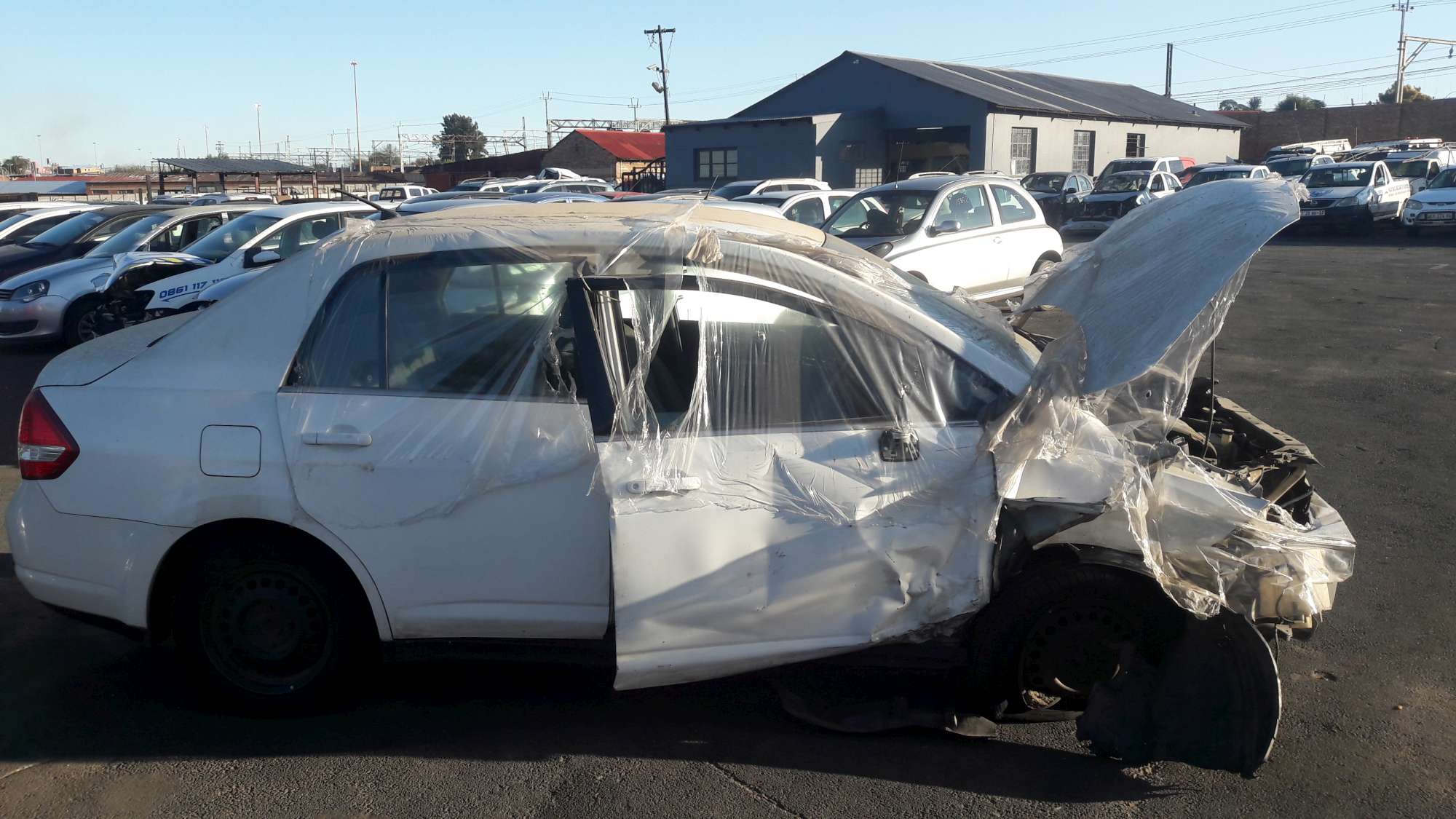 Nissan tiida deals scrap yard